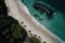 Drone shot of a beautiful blue beach, generative AI