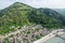 Drone shot of Berat's townscape with a hill, Albania