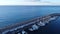 Drone shot of boats on the harbor next to Bordighera, Italy