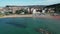 Drone shot of the buildings coastline of Pesaro and the sea in Italy