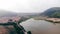 Drone shot flying over Corn field and mountain valley. Blue mountains , sun outdoor green nature mountains, Top view