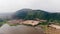 Drone shot flying over Corn field and mountain valley. Blue mountains , sun outdoor green nature mountains, Top view