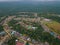 Drone shot of houses from top which is located in Felda Air Tawar 4, Kota Tinggi, Johor, Malaysia.