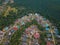Drone shot of houses from top which is located in Felda Air Tawar 4, Kota Tinggi, Johor, Malaysia.