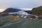 Drone shot of icelandic glacier and blooming lupins field