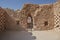 Drone shot of Masada with rocky stone wall fence fortress in Israel in the summer