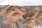 Drone shot of people walking on trail over Kerlingarfjoll mountain of Hveradalir hot springs