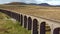 A drone shot of The Ribblehead Viaduct a Grade II listed structure