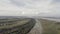 drone shot of the rising water levels in the Mekong after heavy rains hit large parts of the country and caused flooding in field