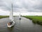 Drone shot of sailboats under typical Dutch grey cloudy sky