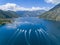 Drone shot of speedboats cruising the Boka Bay, Montenegro.