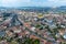 Drone shot of Targu Mures cityscape in Romania seen from above with blue sky on the background