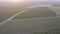 Drone shot of a vineyard plantation intersected by roads