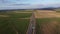 drone shots farmland and road in poland