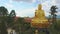 Drone shows fantastic beautiful gold buddha with lotus flower