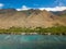 Drone side view of the dry mountains and crystal clear waters of the Lahaina Coast on the island of Maui, Hawaii