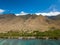 Drone side view of the dry mountains and crystal clear waters of the Lahaina Coast on the island of Maui, Hawaii