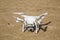 Drone standing in the sand at the beach