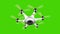 Drone with surveillance camera flying on green screen.