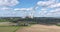 Drone time lapse of a coal-fired power station with smoking chimneys