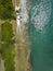 Drone top down view of the crystal clear water, crashing waves, and natural beachs of the Lahaina Coast on the island of Maui,