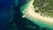 Drone, tropical and island with hut on sand for holiday, vacation or adventure with palm trees and ocean. Aerial view