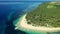 Drone, tropical and island with huts on sand for holiday, vacation or adventure with palm trees and ocean. Aerial view