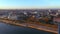 Drone video over the Rhine and Mainz waterfront with Theodor Heuss Bridge in the morning during sunrise