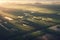 Drone view of agriculture farming, fields stretching a symphony of green crops, farmer and tractor farming Photography from top