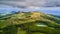 Drone view of amazing Azores landscape. Green fields on the north coast of San Miguel island, Azores, Portugal. Bird eye view,