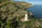 Drone view of an ancient medieval tower of Mediterranean Sea coast defence in Spain. Torre de la Corda in Oropesa, Spain