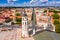 Drone view of the Cathedral Square of Vilnius under a blue cloudy sky and sunlight in Lithuania