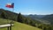 Drone view of Chilean flag and Villarica volcano in the beginning of route to Heart lagoon laguna corazon in Chile.