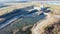 Drone view electrical substation, powerhouse with hydroelectric turbines over Denison Dam and Lake Texoma