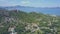 Drone view fishermen village against sea distant peninsula