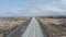 Drone view flight towards Ring Road, highway route no. 1 in Iceland. Cars driving peacefully on the main road with