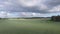 Drone view: flying over beautiful wheat fields in the rural countryside