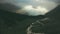 Drone view foggy mountain valley. Beautiful view mountain trail and peaks