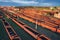 Drone view of freight trains at sunset. Old Railway cargo wagons