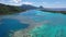 Drone view of French Polynesia Tahiti island Huahine and Motu coral reef lagoon