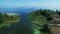 Drone view island and farming field on shore. Blue sea on clear horizon view