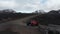 Drone view jeep car parked on dirt road in Iceland countryside. Expedition and adventure. Aerial view of a offroad