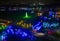 Drone View of Large Drive Thru Christmas Display, With Lots of Colored Lights, Trees, and Landscapes