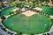 Drone view of a multi-use playfield with football and baseball diamonds