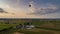 Drone View of Multiple Colorful hot air balloons Launching During a Sunset on a Summer Afternoon