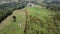 Drone view natural scenery of hills, farm fields and forests
