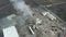 Drone view orbit around the central establishment of Colas in Iceland. Aerial view of asphalt industry with