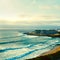 Drone view over sandy beach  touristic city Ericeira , Portugal. Aerial view - touristic coastline on summer while sunset.