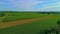 Drone View Passing Thru Smoke and Seeing Amish Farmlands on a Sunny Summer Morning