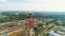 Drone View Pipe with Burning Torch above Oil Plant